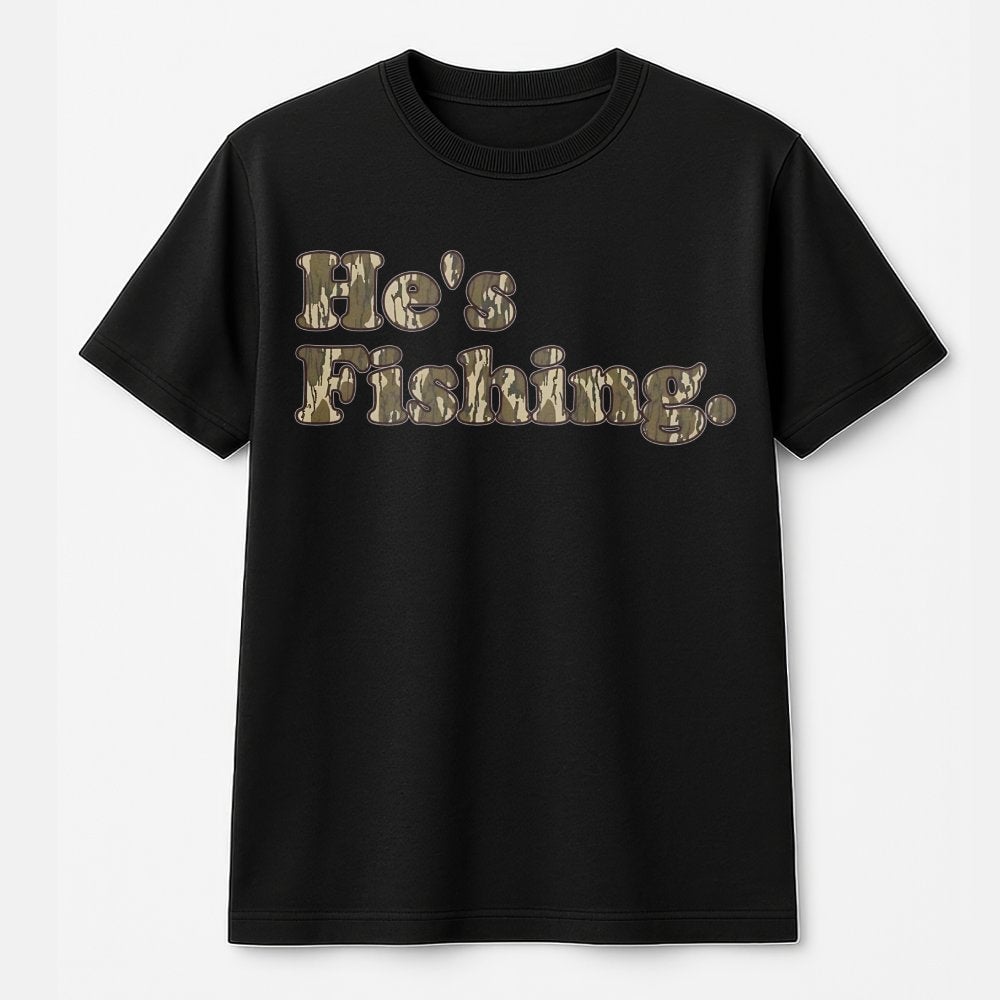 He's Fishing T-Shirt | Camo Print Text Graphic | 100% Cotton Premium Tee | Outdoorsman Gift for Fisherman